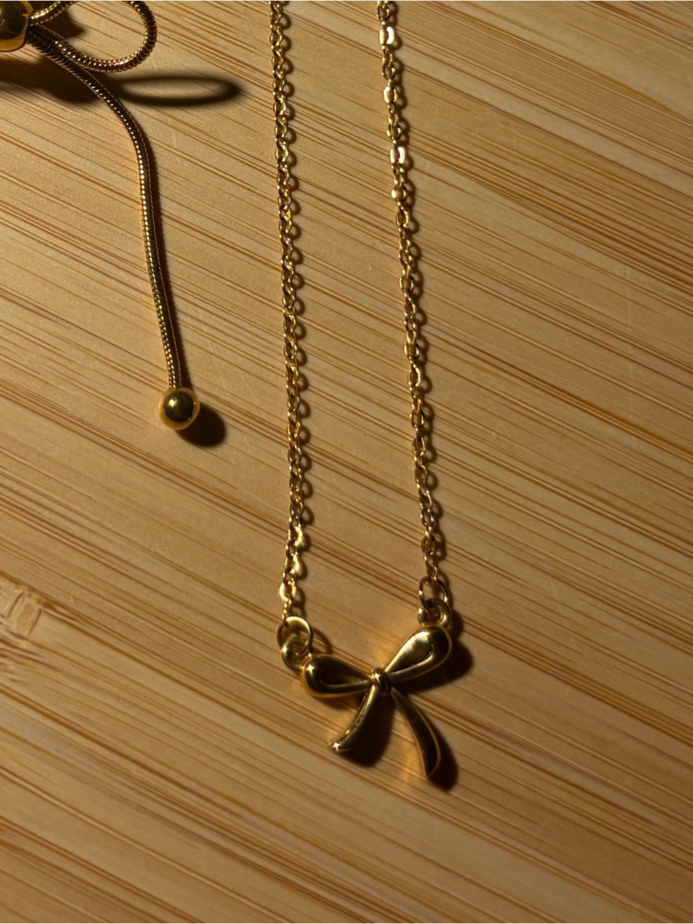 Stainless steel bow necklace and earrings set